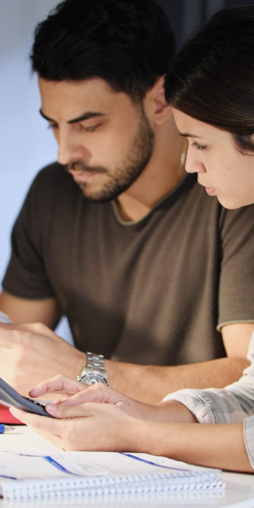 Man and woman worried about debts